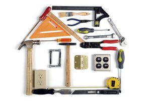 House made of tools over white background